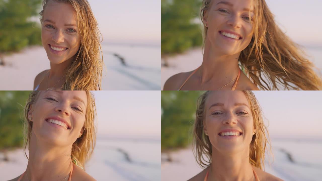 诱人的女人享受海滩景色，对着相机微笑。阳光放松。