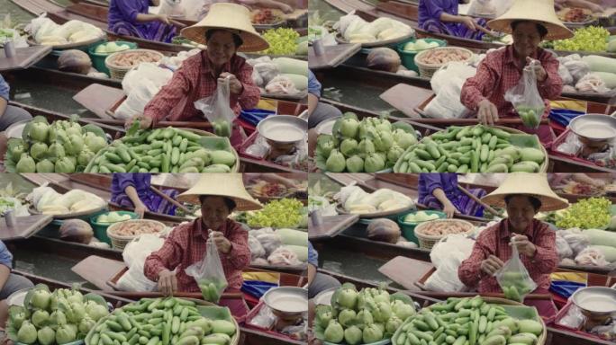 浮动市场上的买方泰国早市泰国农产品水上一