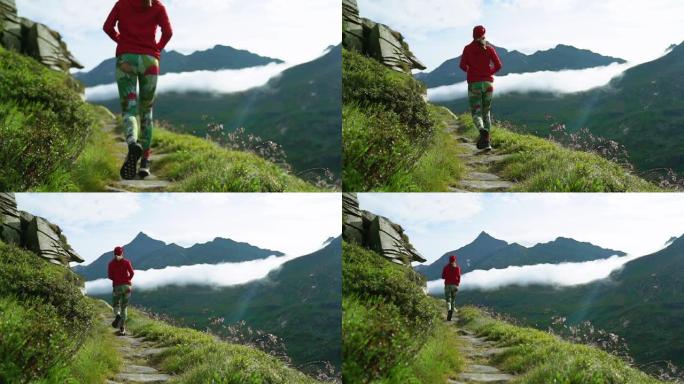 山地慢跑。沿着山路奔跑的女人