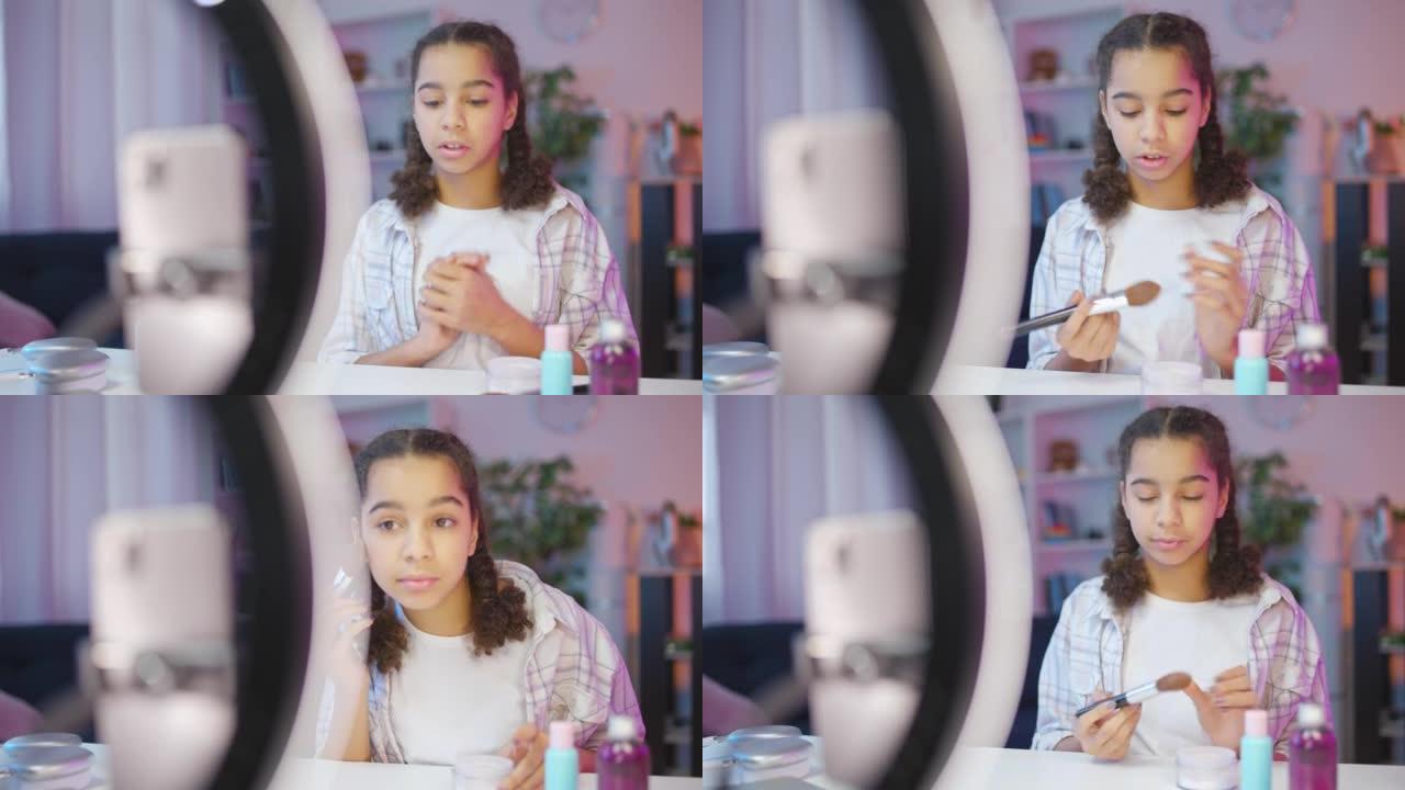 十几岁的女孩解释如何化妆，美容博主录制视频