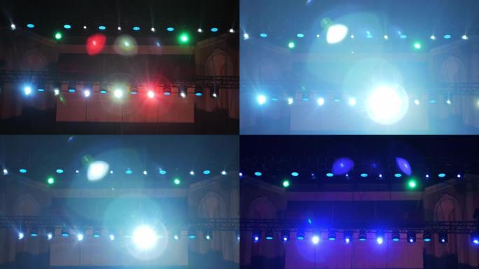 街头舞台上的聚光灯闪烁着五彩灯。