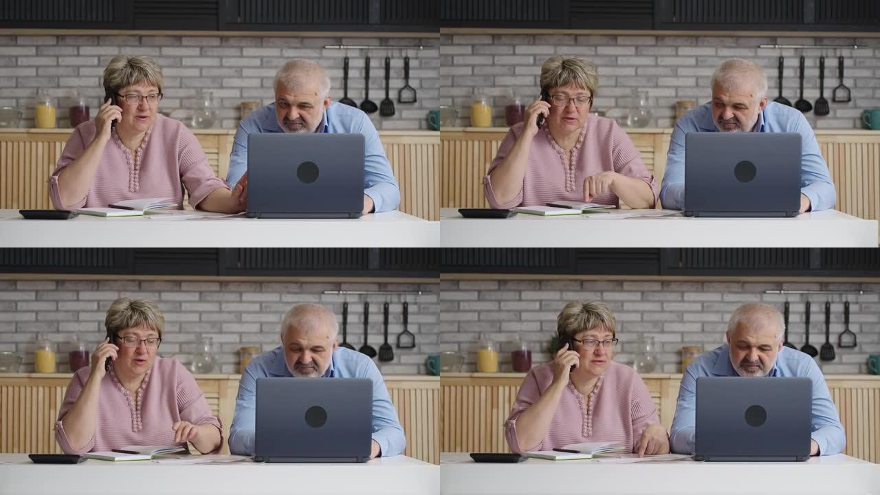 退休妇女正在打电话给公用事业公司并咨询付款，她的丈夫坐在附近，用笔记本电脑浏览互联网