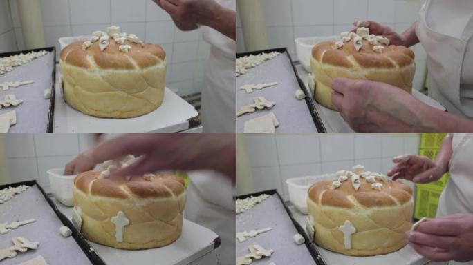 面目全非的女面包师装饰面包蛋糕