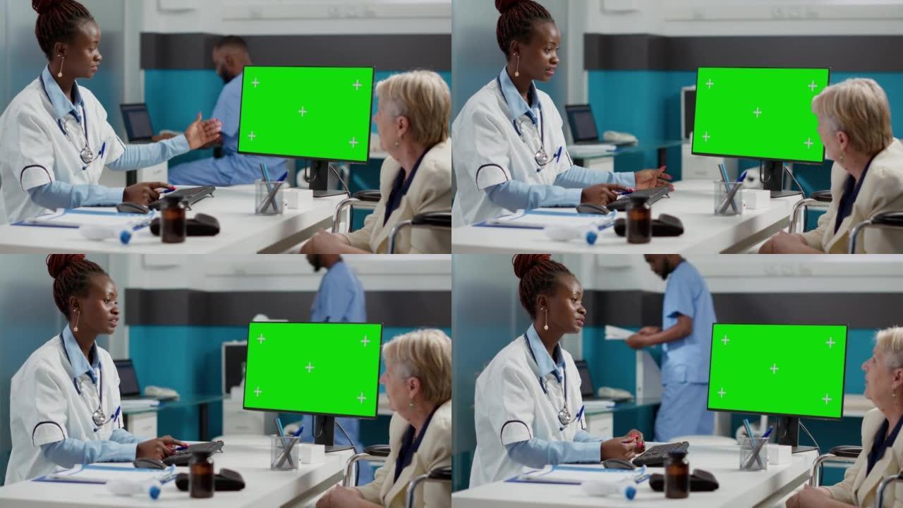 女军医和瘫痪患者在监视器上分析绿屏
