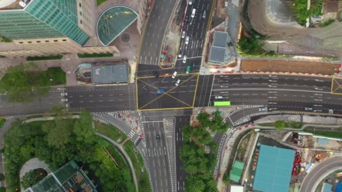 白天新加坡市中心交通街十字路口空中俯冲全景4k