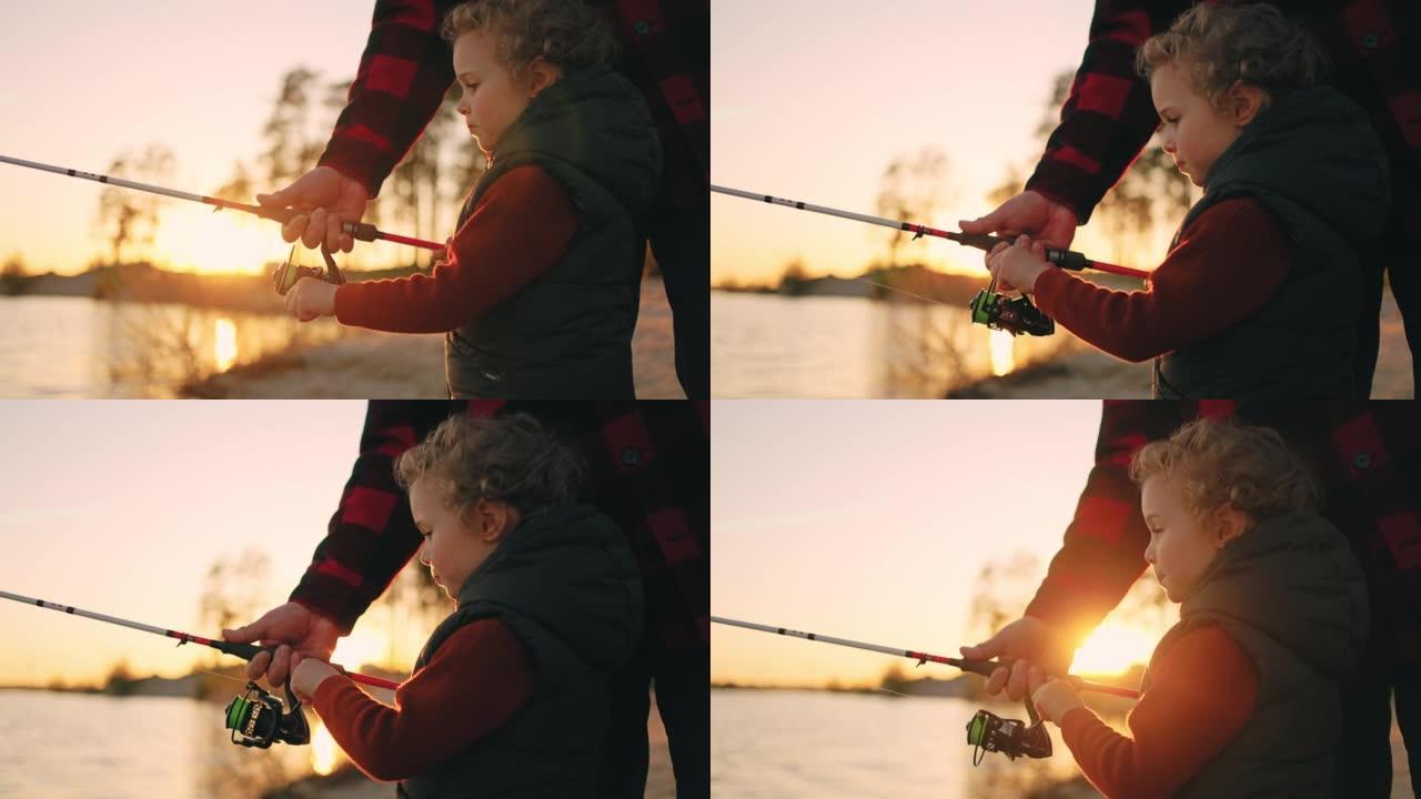 日落时在河边或湖边钓鱼，小男孩正在用鱼竿抓鱼，父亲或爷爷正在帮忙