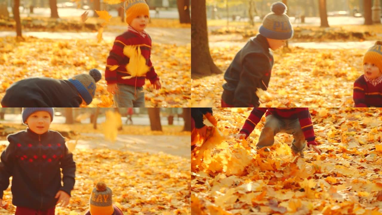 孩子们在城市公园玩秋叶，向空中扔黄叶