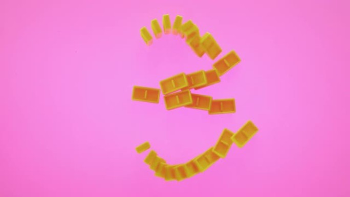 形状为数字 “3” 的SLO MO LD黄色多米诺瓷砖落在粉红色表面上