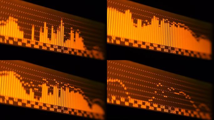 专业音乐会均衡器显示屏上有黄色频谱分析仪