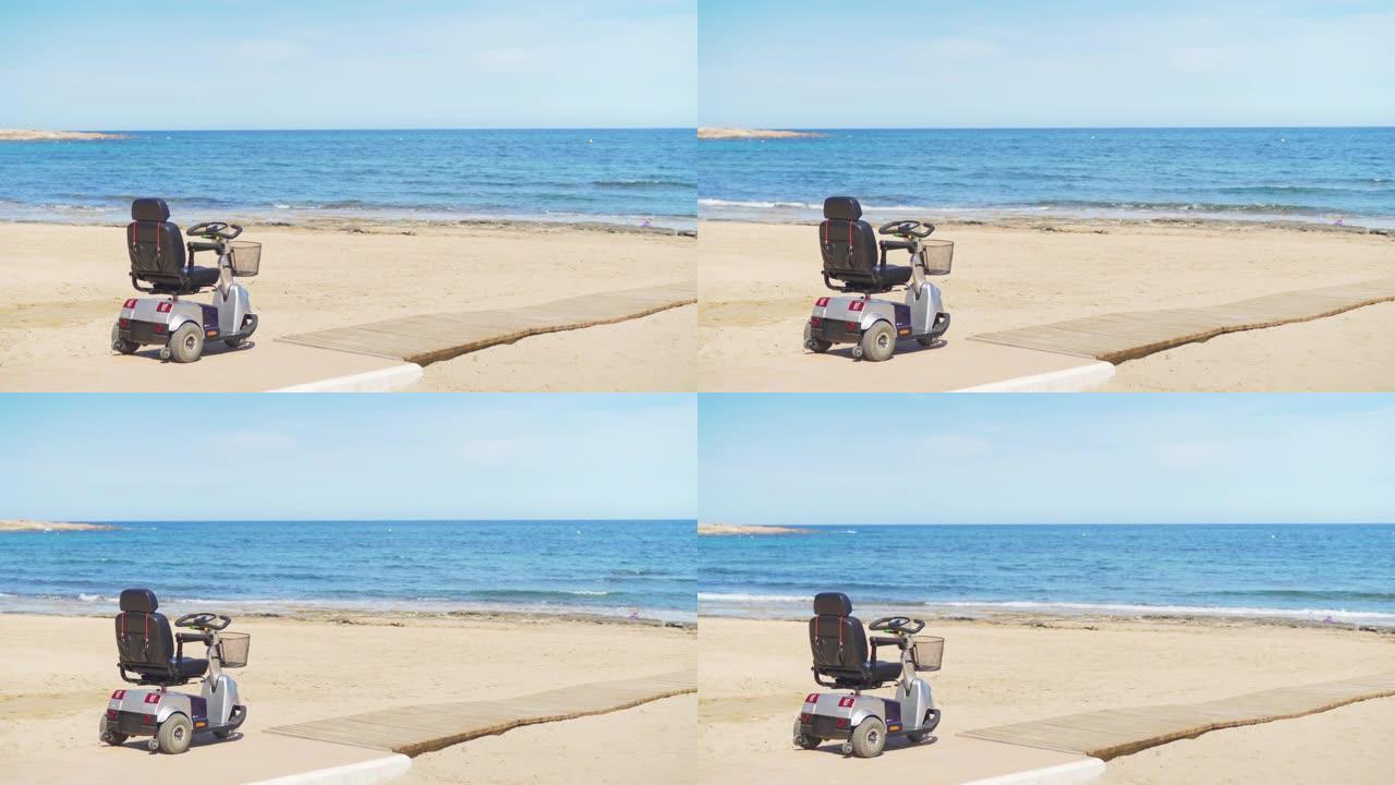 沙滩上的电动轮椅背景是大海