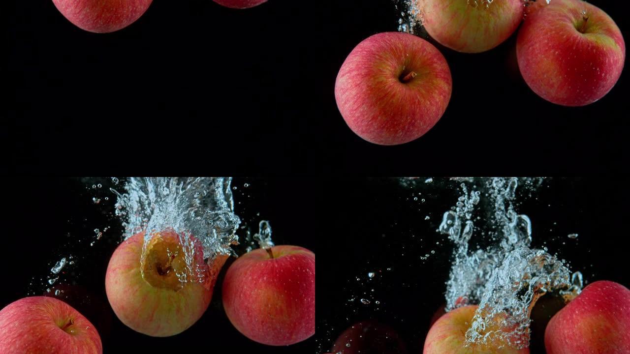 SLO MO LD苹果掉入水中并产生气泡