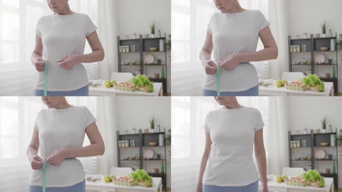 适合中年女士用胶带测量腰围，健身和体重控制饮食