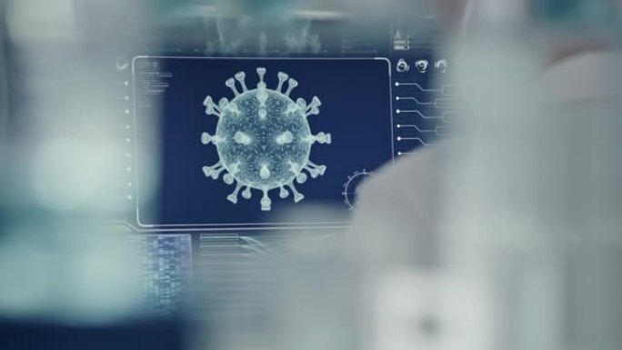 未来实验室计算机-冠状病毒测试。在屏幕上关闭。科学家的后视图
