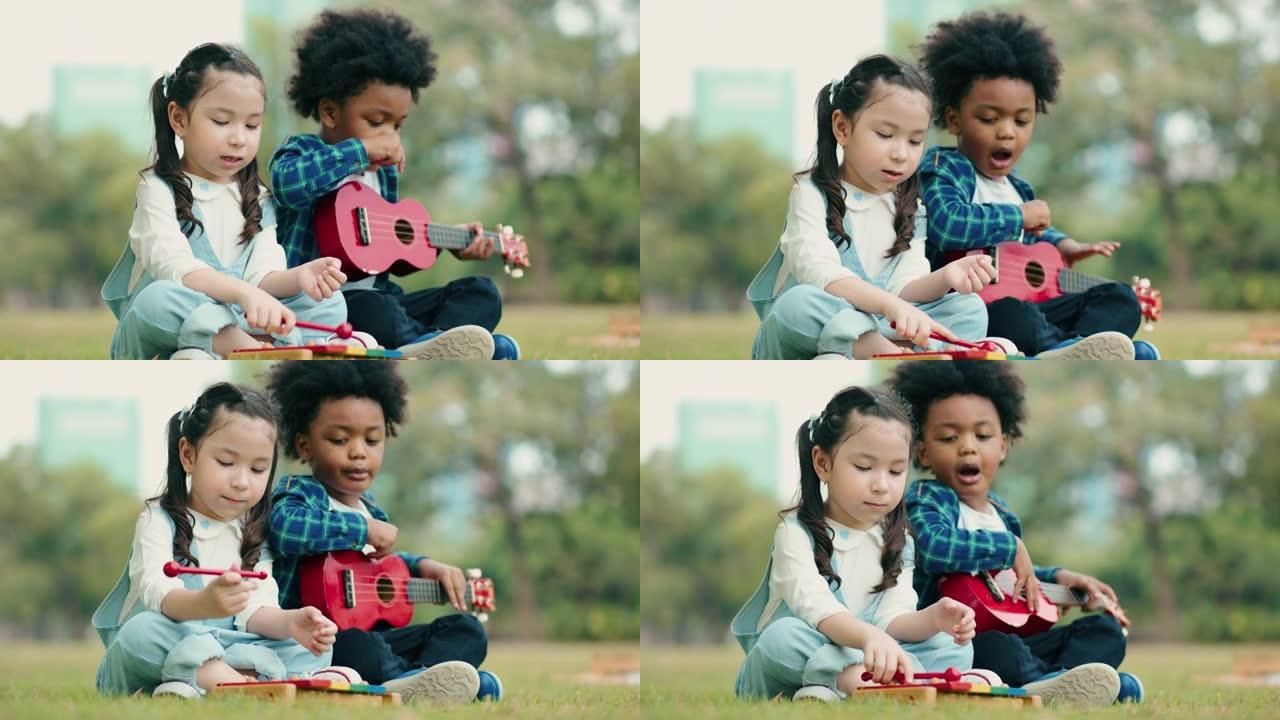 玩玩具吉他的女孩和男孩