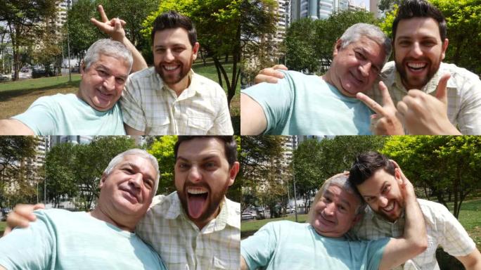 爸爸和儿子在公园里自拍照片