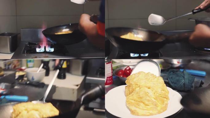 CU: 厨师在煎锅里煮煎蛋。