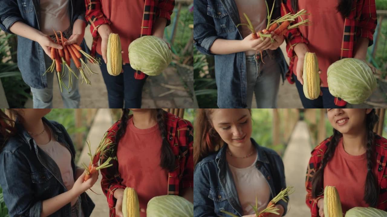 两个十几岁的女农夫的肖像以他们农场的蔬菜为荣。