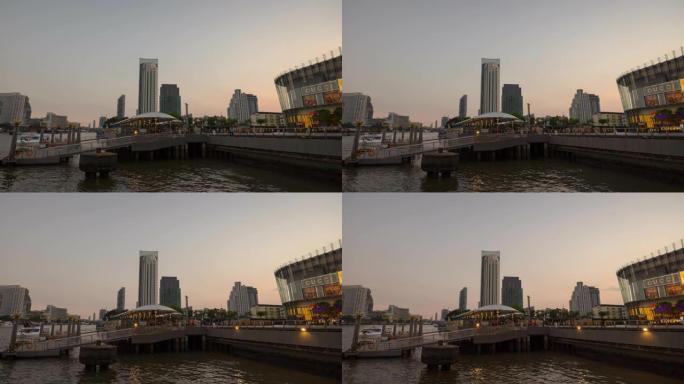 日落时间曼谷市现代购物中心河畔轮渡站全景4k泰国延时