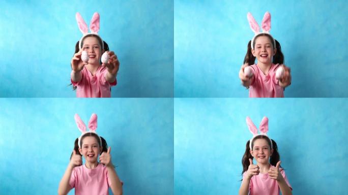 一个穿着复活节兔子服装的可爱的小女孩手里拿着复活节彩蛋。
