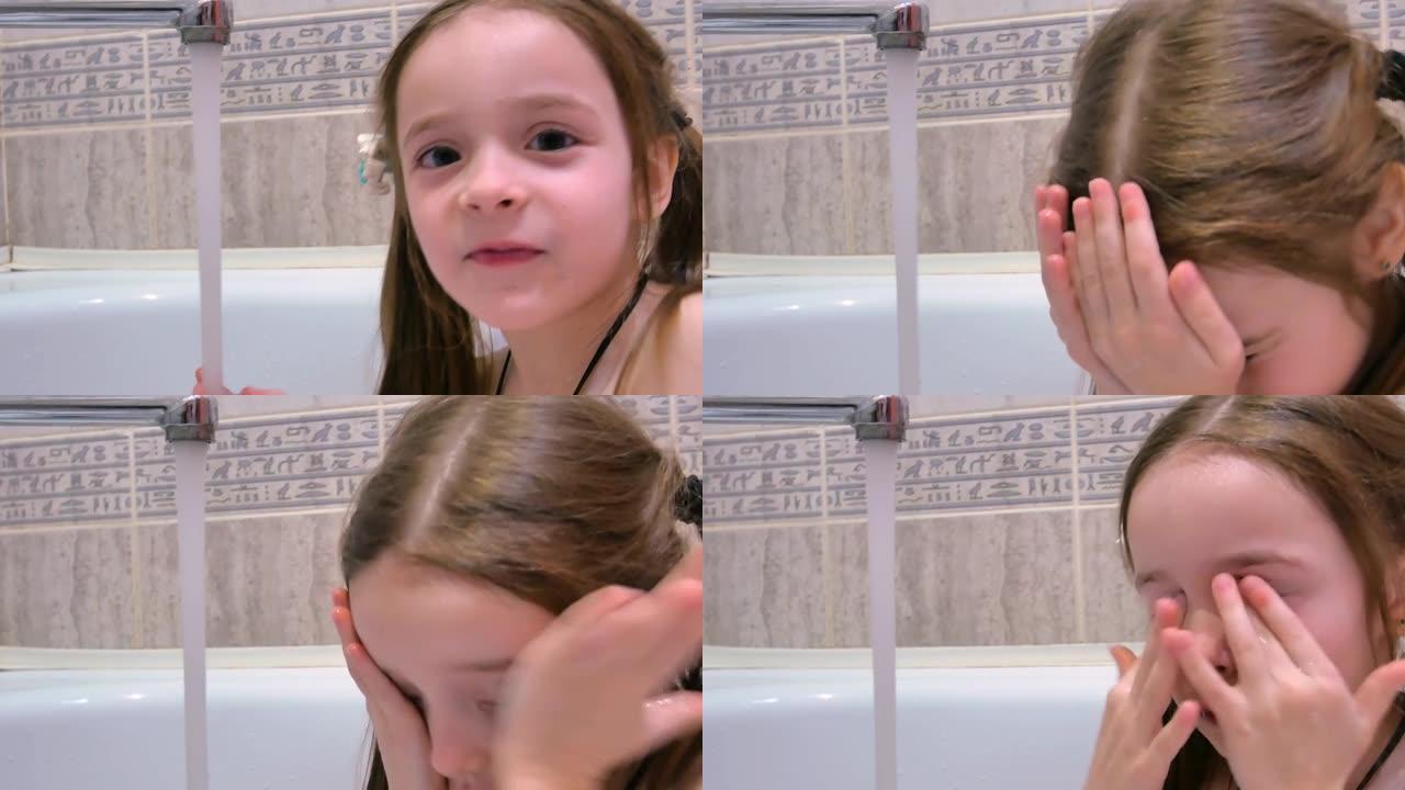 一个坐在浴室里的小女孩甜蜜地洗漱，手里拿着水，擦着脸和眼睛，头发湿漉漉的，衣衫不乱。儿童口腔卫生的概