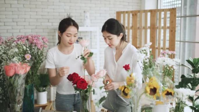 两名在花店工作的亚洲迷人女性。