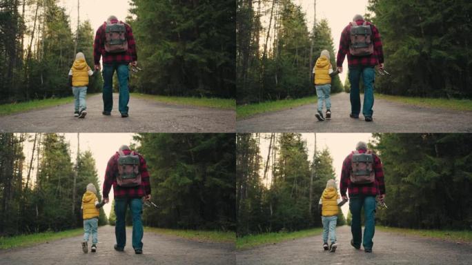 小男孩和他的爷爷早上步行去钓鱼，在针叶林风景如画的路上漫步