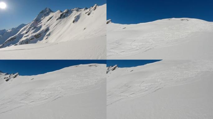 在阳光明媚的日子里，滑雪者从白雪皑皑的山腰下降的第一人称视角