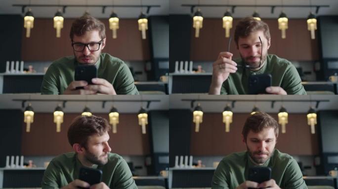 男人正在用智能手机阅读坏消息，放下眼镜和摇摇头，失败者的肖像