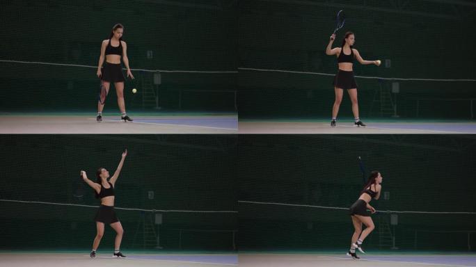 年轻苗条的女子穿着网球运动服在球场上扔球并发球，全身肖像在室内射击