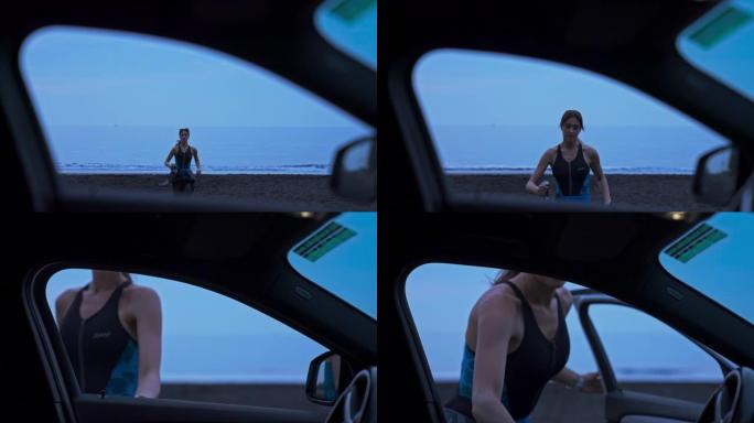 在田园诗般的海滩慢跑后的女人。透过SUV窗户看