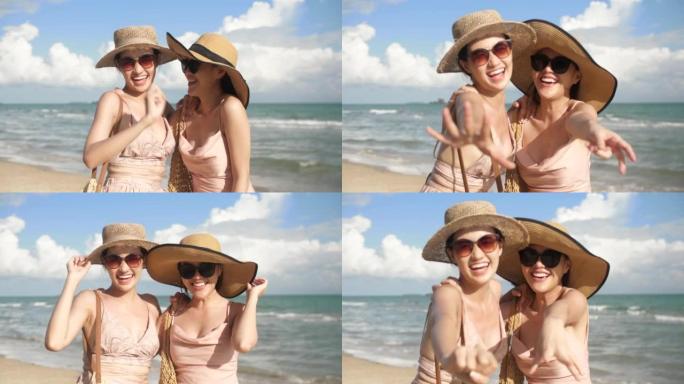 4k视频片段，一个快乐的女人在海滩上给他们的朋友自拍