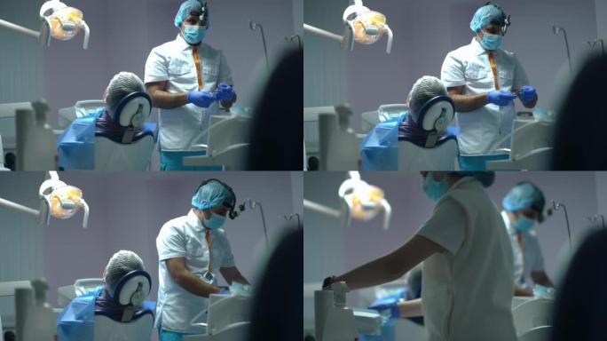 从自信的中东牙医准备麻醉注射到辅助医疗工具慢动作的支架重点。专业医生和护士在医院准备治疗。