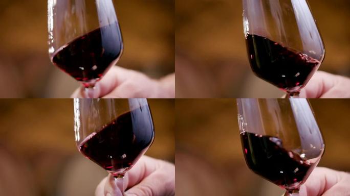在玻璃杯中挥动的红酒的特写镜头
