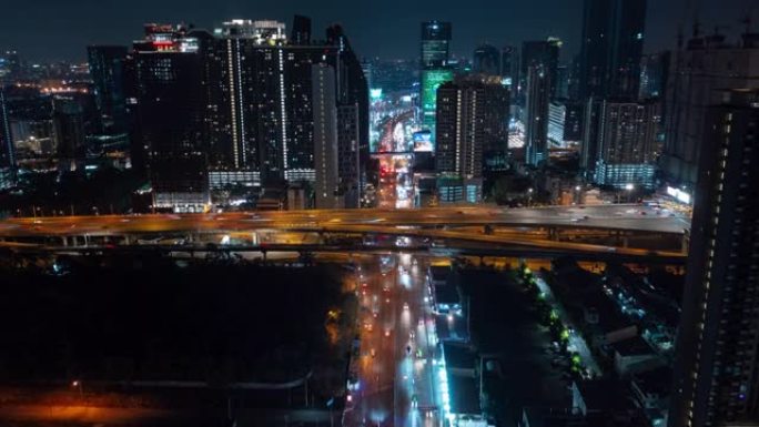 夜间照明曼谷城市景观市中心交通街河边空中全景4k延时泰国