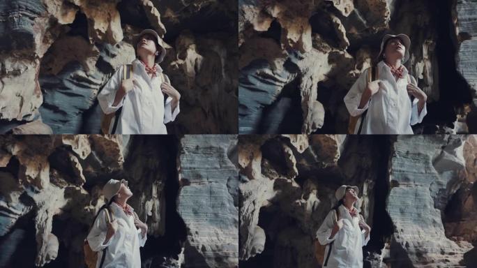 探索洞穴的女游客