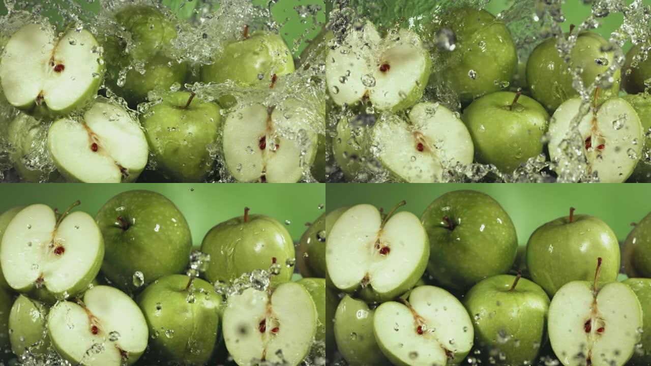 绿苹果水溅过苹果片的慢动作镜头