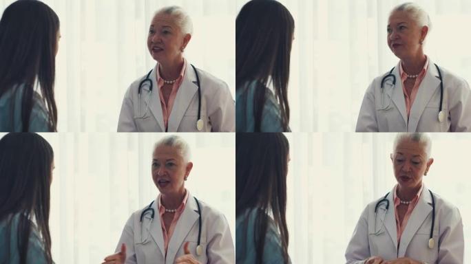 美丽的医生和她的病人交谈。