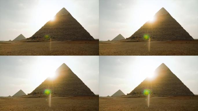 边缘有太阳耀斑的吉萨金字塔视图