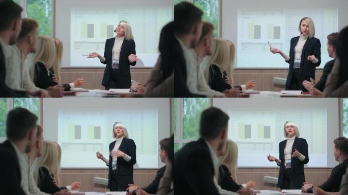 女性在会议或商务会议上发言，女性金融专家在教育专家