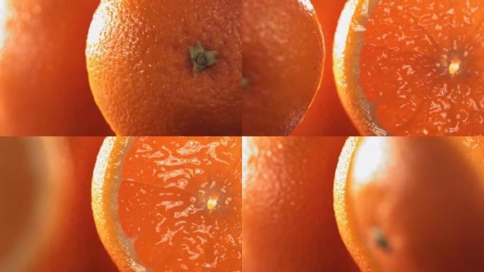 滚动一半的新鲜橙子，并以慢动作打开水果的内部。4K