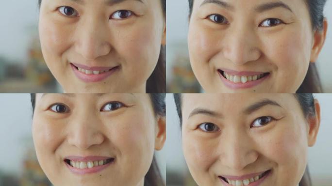 一名亚洲女子微笑着对着镜头的SLO MO TU脸