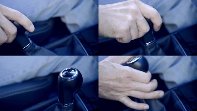 驾驶员的手拿一个杠杆并啮合变速器中的齿轮