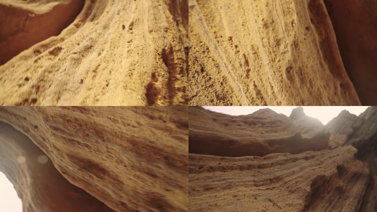 干旱气候下干燥的红色峡谷。特内里费岛阿马里拉海滩岩石走廊中的相机旋转