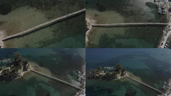 史诗般的鸟瞰图无人机拍摄了从岸边到海洋岛的长桥。