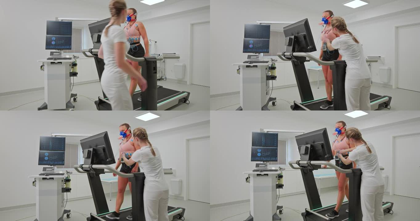 女护士从站在跑步机测力计上的女运动员身上取下电极