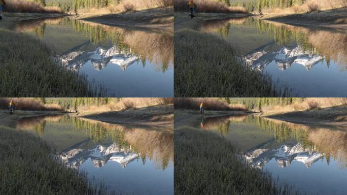 山溪边缘的成熟男子自行车