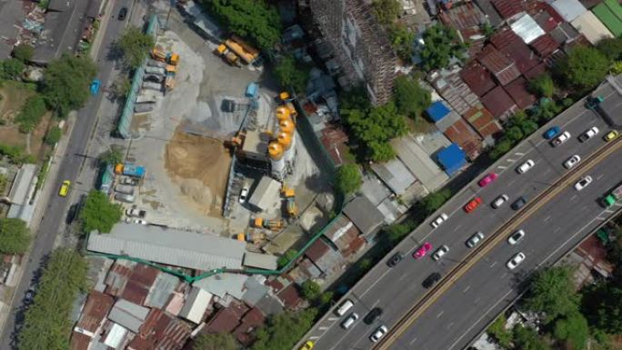 晴天曼谷城市景观交通街混凝土工厂庭院空中俯拍全景4k泰国