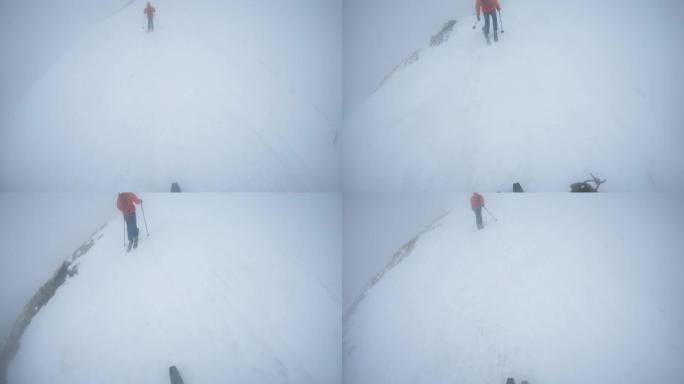 一队登山者在山顶上移动。冬季冒险