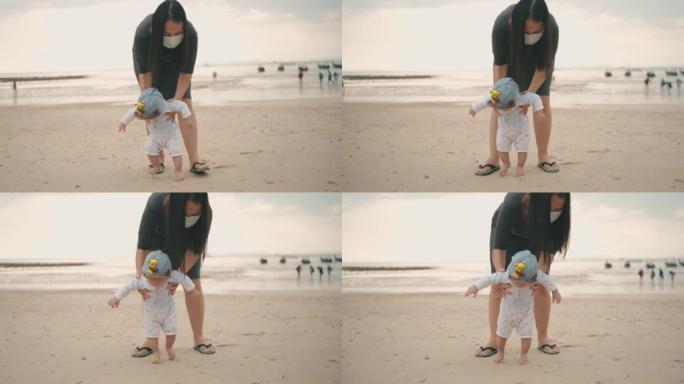 Mother and son enjoying summer beach together.