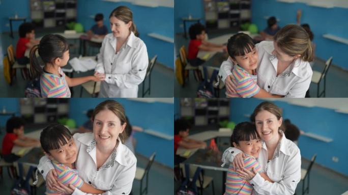 老师在教室里拥抱学生的照片